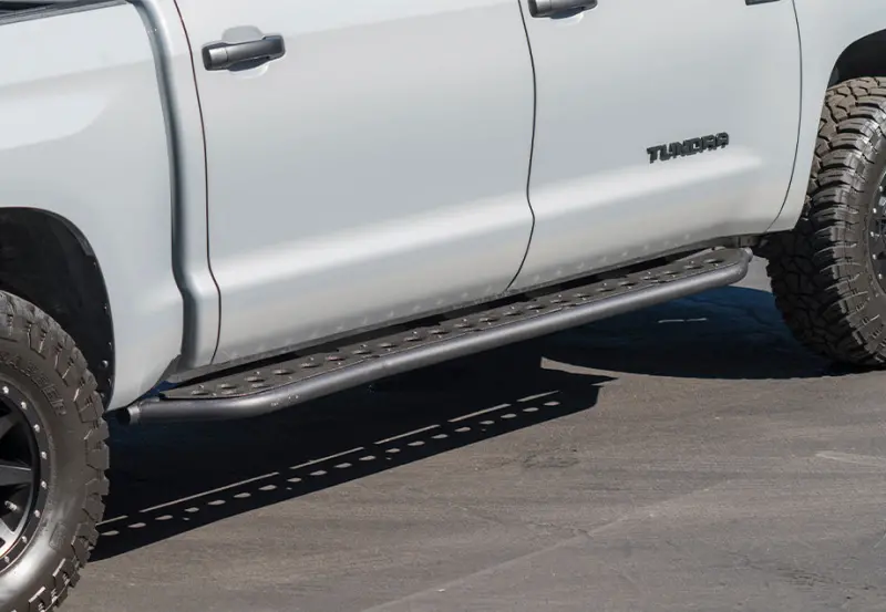 Cali Raised Rock Sliders For 2014–2021 Toyota Tundra – Kick-Out Design With Powder-Coated Or Raw Steel Finish 1